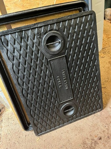 Cast iron manhole cover with - cast,
